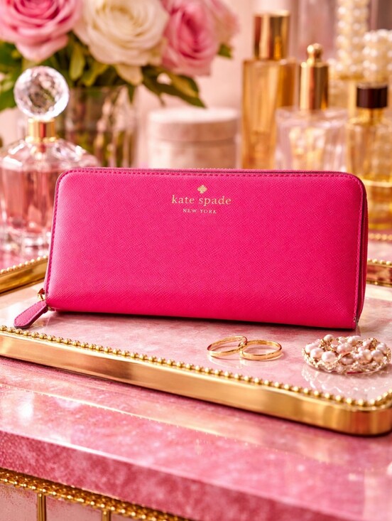 kate spade Handbags - Kate Spade Hot Pink Zip Around Wallet - GUC